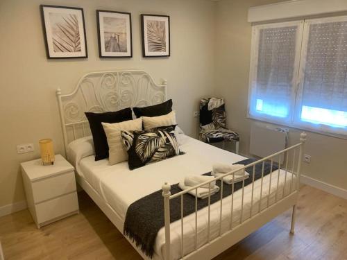 Postel nebo postele na pokoji v ubytování Piso luminoso en Villaviciosa