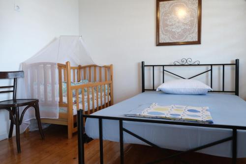 Postel nebo postele na pokoji v ubytování MangoSeaview Home1