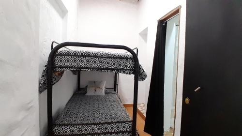 Ένα ή περισσότερα κρεβάτια σε δωμάτιο στο san carlos beach inn