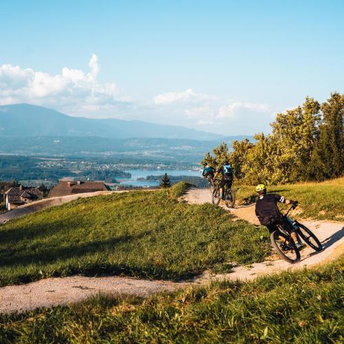 a group of people riding bikes down a dirt road at Ferienwohnungen Theresienhof in Ledenitzen