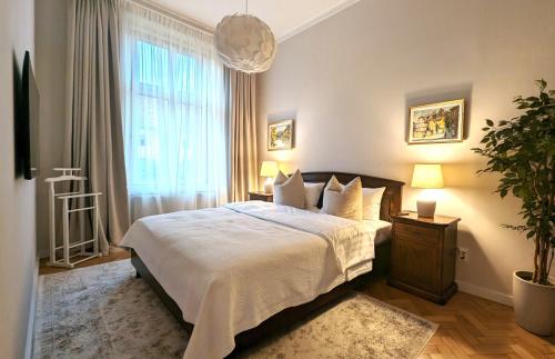 Giường trong phòng chung tại Apartments in Historic Center, Quiet Area, AC