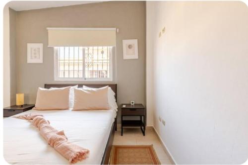 Postel nebo postele na pokoji v ubytování Amplio apartmento