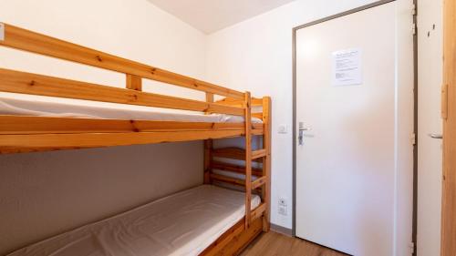 Postel nebo postele na pokoji v ubytování Studio très agréable Morillon 1100 - 2/4 pers