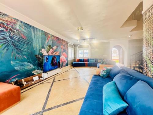 Un lugar para sentarse en Villa Mly Ismail avec piscine privative