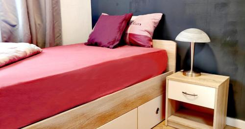 Ένα ή περισσότερα κρεβάτια σε δωμάτιο στο Wohnung Grace im Erdgeschoss mit Balkon