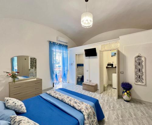 En eller flere senge i et værelse på Villino Annamaria