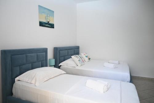 เตียงในห้องที่ Vila Bilbil