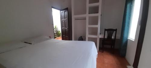 Ένα ή περισσότερα κρεβάτια σε δωμάτιο στο Managua Inn