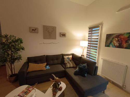 Ein Sitzbereich in der Unterkunft Chambre à 25 min de Paris - appartement partagé
