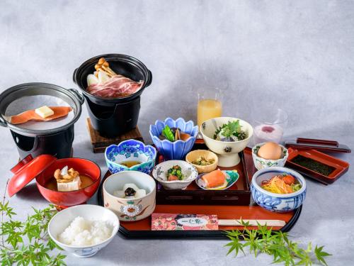 a tray filled with different types of food and drinks at Isshinkan in Nikko