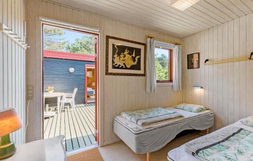 Ένα ή περισσότερα κρεβάτια σε δωμάτιο στο Lovely Home In Hundested With Wifi