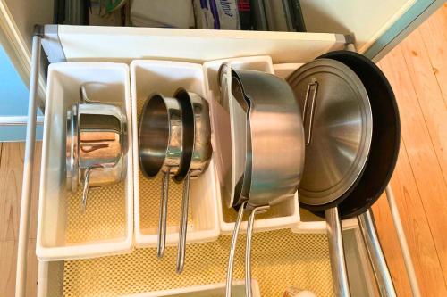 a group of utensils in a drawer in a kitchen at Suite Villa Costadelaroca Manazuru in Manazuru