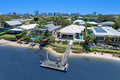 an aerial view of a house on the water at Pay for 3 nights, get 4th night for free in March in Mooloolaba