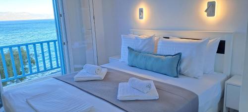 Ένα ή περισσότερα κρεβάτια σε δωμάτιο στο Dinas Inn 