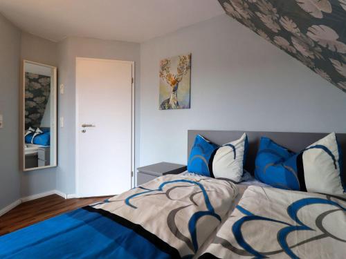 Ένα ή περισσότερα κρεβάτια σε δωμάτιο στο Ferienhaus Seeluft in Klein Labenz