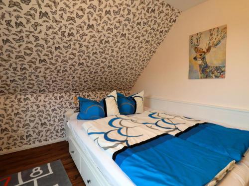 Ένα ή περισσότερα κρεβάτια σε δωμάτιο στο Ferienhaus Seeluft in Klein Labenz