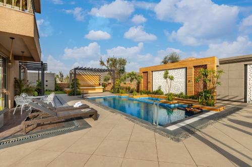 Gallery image of ELIVAAS Snehzy Luxurious 3BHK Villa with a Pvt Pool in Jaipur in Dhānd