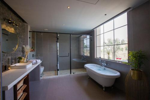 Gallery image of ELIVAAS Snehzy Luxurious 3BHK Villa with a Pvt Pool in Jaipur in Dhānd