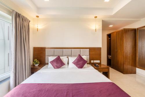 Cama o camas de una habitación en Destino by Monday Hotels Gachibowli