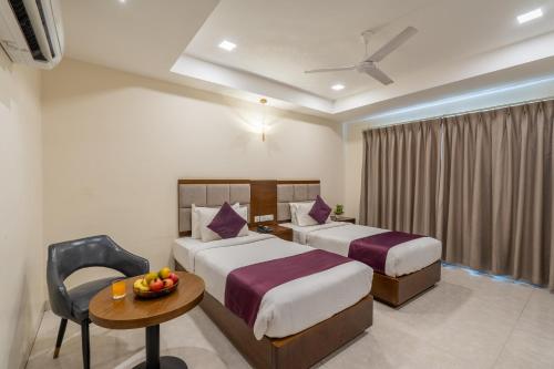 Cama o camas de una habitación en Destino by Monday Hotels Gachibowli