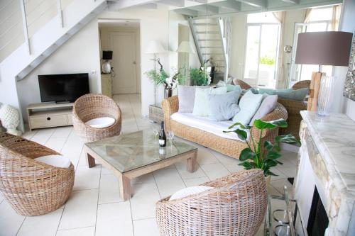 Duplex climatisé avec terrasse vue mer au pied de la plage