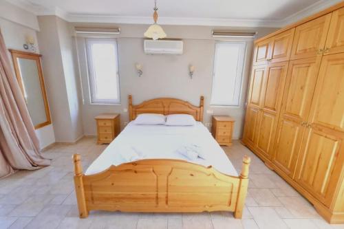Postel nebo postele na pokoji v ubytování Müstakil Özel Havuzlu Villa