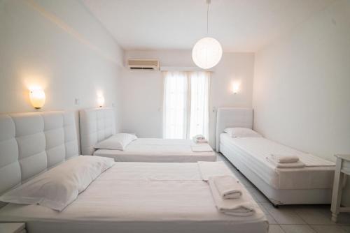 Ένα ή περισσότερα κρεβάτια σε δωμάτιο στο Hotel Sagterra 