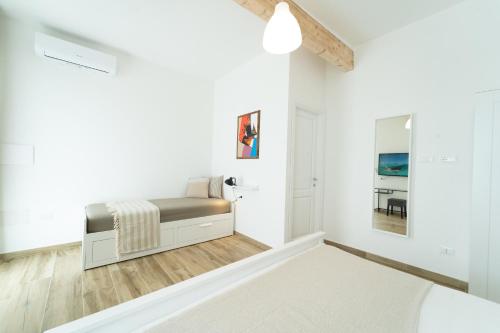 Postel nebo postele na pokoji v ubytování Velis - art & hospitality