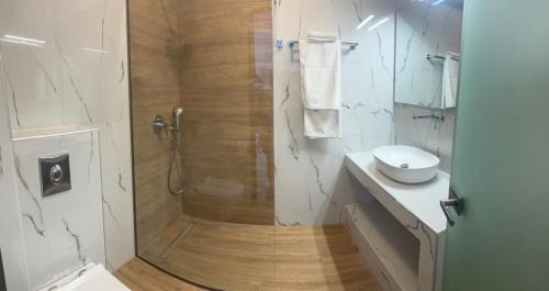 Ένα μπάνιο στο Apartment Spyros Ammoudi