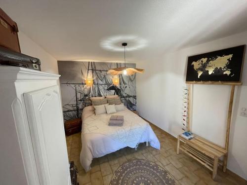 Cama o camas de una habitación en Villa avec piscine et vue somptueuse