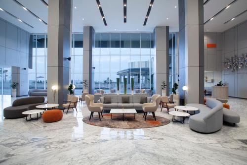 Χώρος καθιστικού στο HARRIS Hotel & Convention Cibinong City Mall Bogor