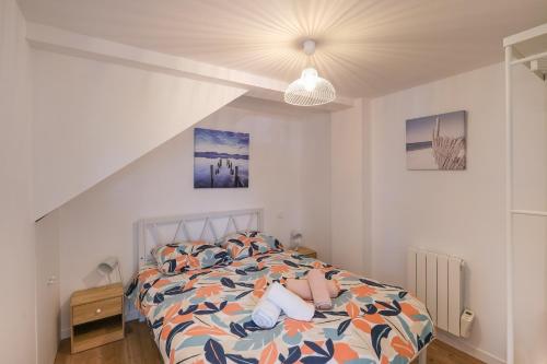 Postel nebo postele na pokoji v ubytování La Maritime - Vue port, 50 m de la plage de la baie