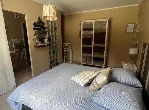 Letto o letti in una camera di Villa QUINISSOLE