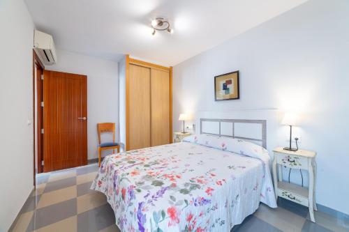 Posteľ alebo postele v izbe v ubytovaní Apartamento Esbamar Vi