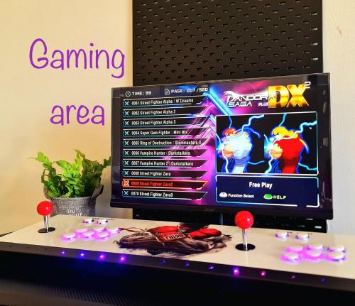 a computer screen with a video game on it at Melaka Relax Home - 6 pax - SeaView corner unit - 6 min to Historical Spot & Jonker in Melaka