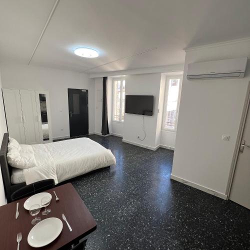 Postel nebo postele na pokoji v ubytování Suite studio entier St Charles, Canebiere, Vieux-Port Appartement