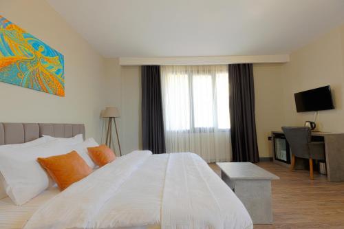 Postel nebo postele na pokoji v ubytování Grand royal hotel