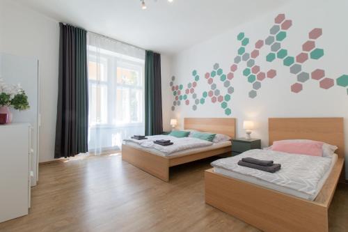 Postel nebo postele na pokoji v ubytování Stay Inn Apartments Naplavka