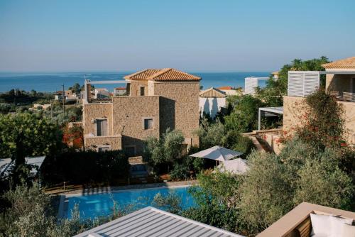a view of a resort with a swimming pool at Riglia Villas in Riglia