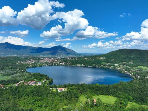 an aerial view of a lake in the mountains at Cascina Girba in Giaveno