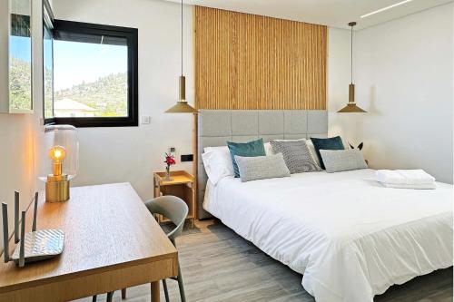 Ένα ή περισσότερα κρεβάτια σε δωμάτιο στο VV Casa Aserradero