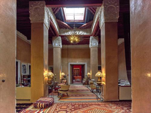 a lobby of a hotel with a large ceiling at Kasbah Agafay Hotel & Spa in El Karia