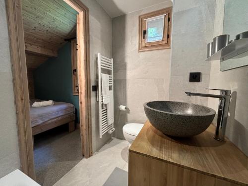 Ένα ή περισσότερα κρεβάτια σε δωμάτιο στο Chalet Tamara Clés Blanches Courchevel