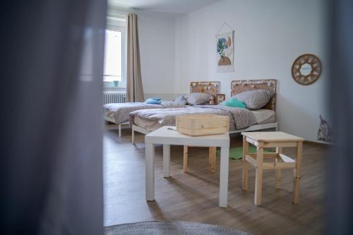 Postel nebo postele na pokoji v ubytování Velký apartmán V Pralese Šumava
