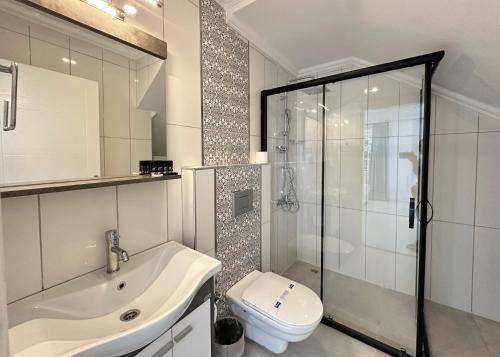 Bilik mandi di Bossa Nova Apart Hotel