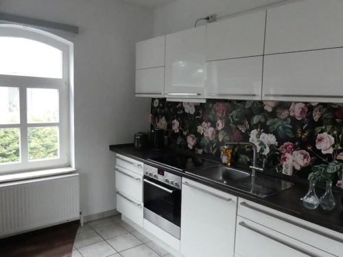 Η κουζίνα ή μικρή κουζίνα στο 2 Zimmer Hannover Bothfeld für 4 Personen