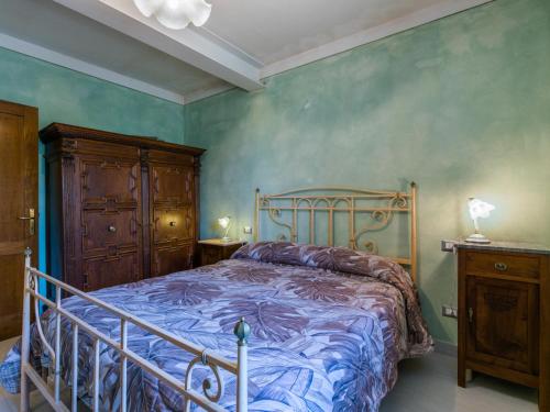 Ένα ή περισσότερα κρεβάτια σε δωμάτιο στο Holiday Home L'Oliviera by Interhome