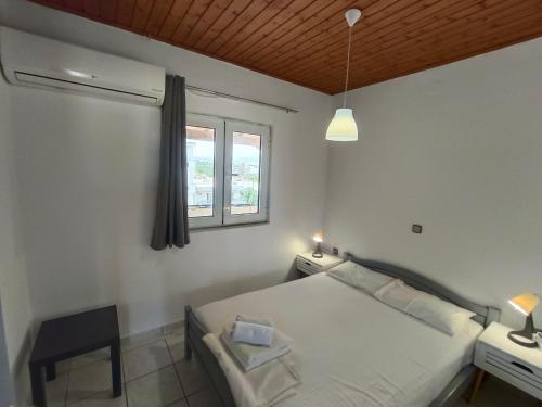 Postel nebo postele na pokoji v ubytování Albatross Apartments