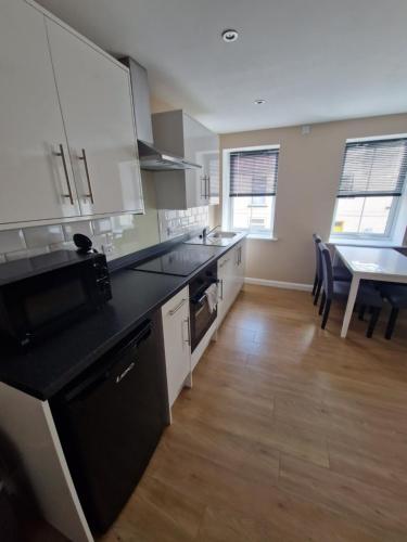 Kuchyň nebo kuchyňský kout v ubytování 4b Smart Apartments