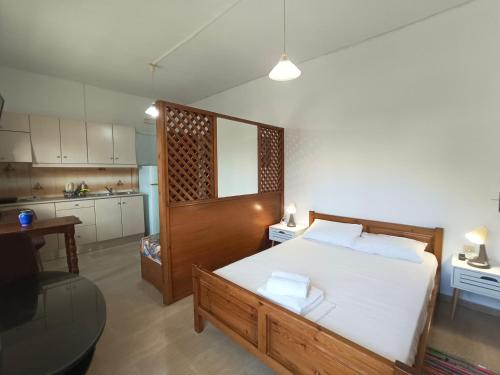 Postel nebo postele na pokoji v ubytování Albatross Apartments
